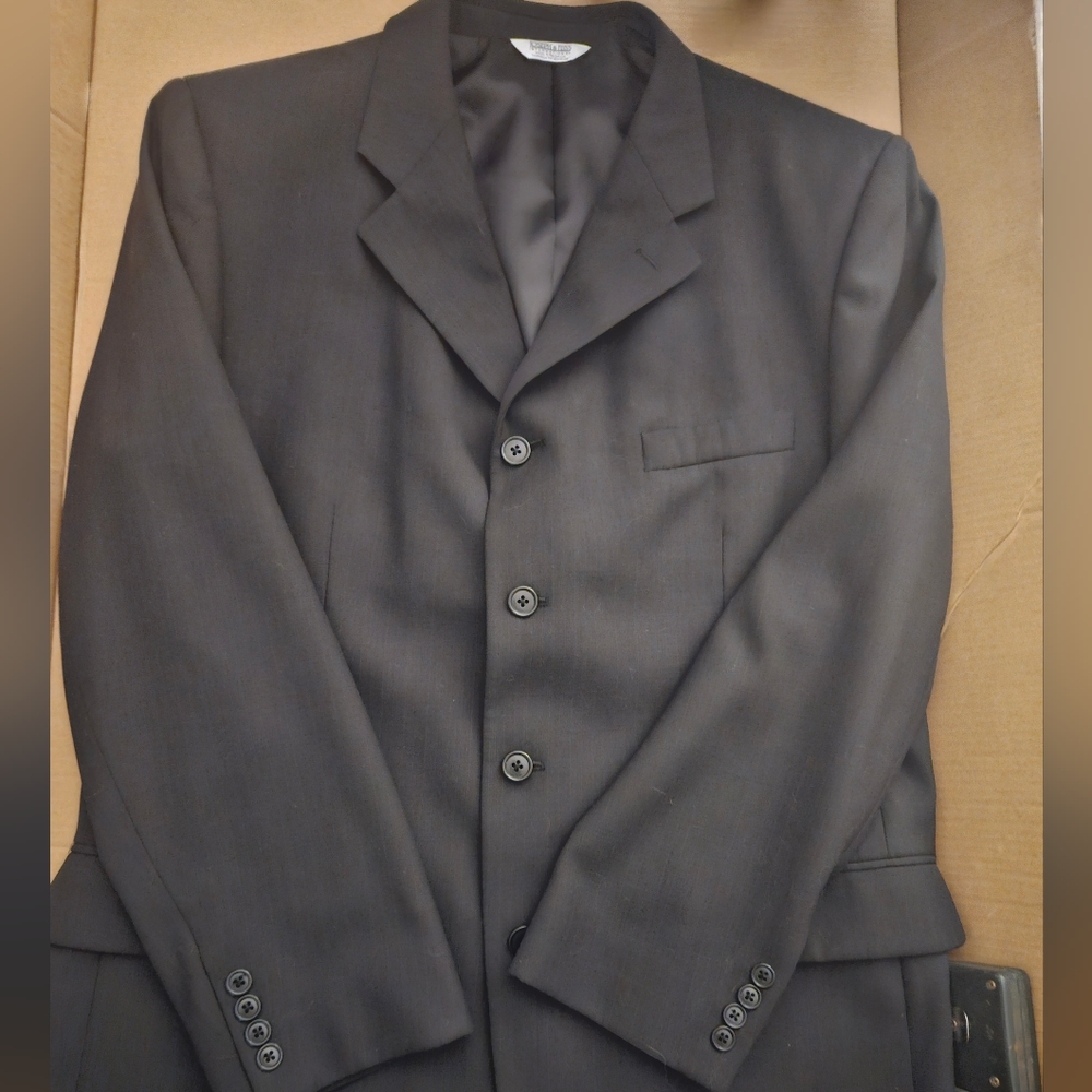 Never worn black suit with blazer and pants 44R